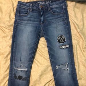 American Eagle jeans that has rips and patches on them